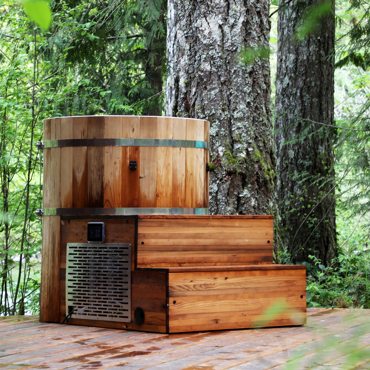 Redwood Outdoors Alaskan All-In_One Cold Plunge Tub made of heat treated wood exterior view with the lid off on a wood deck.