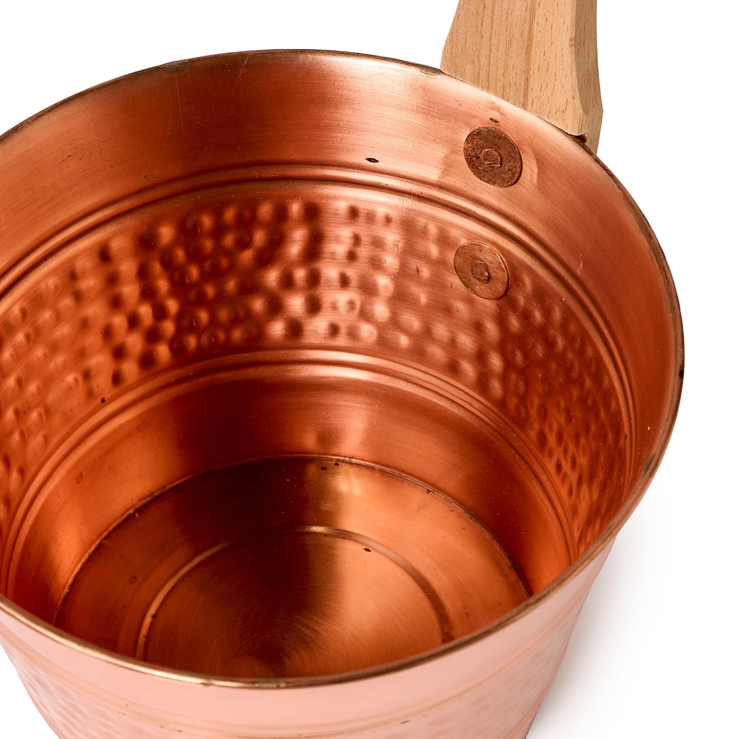 Copper bucket with wooden handle close up