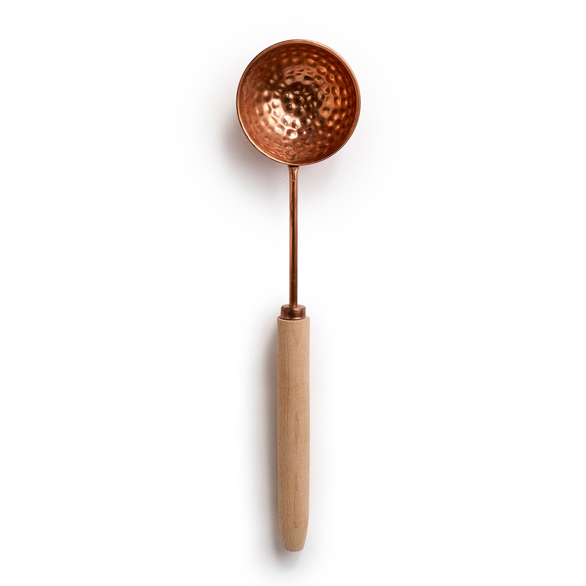Copper ladle with wooden handle full view