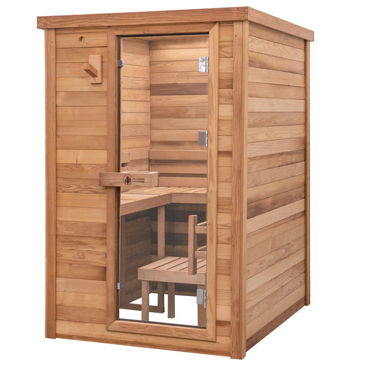 Redwood Outdoors Haven 3 person indoor sauna, made of hemlock wood with a glass door, exterior front angle view.
