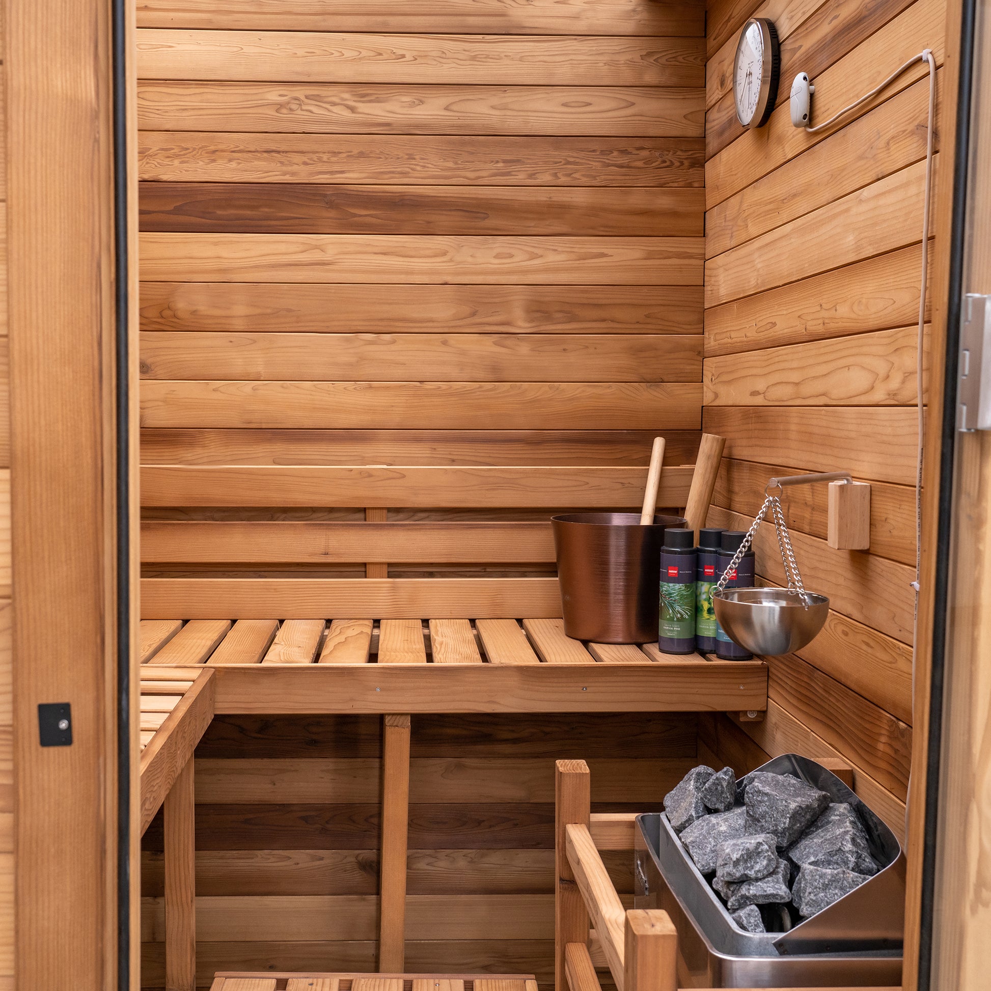Redwood Outdoors Haven 3 person indoor sauna, made of hemlock wood interior view of the front of the sauna