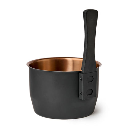 Black bucket with copper inside with a wooden handle back view