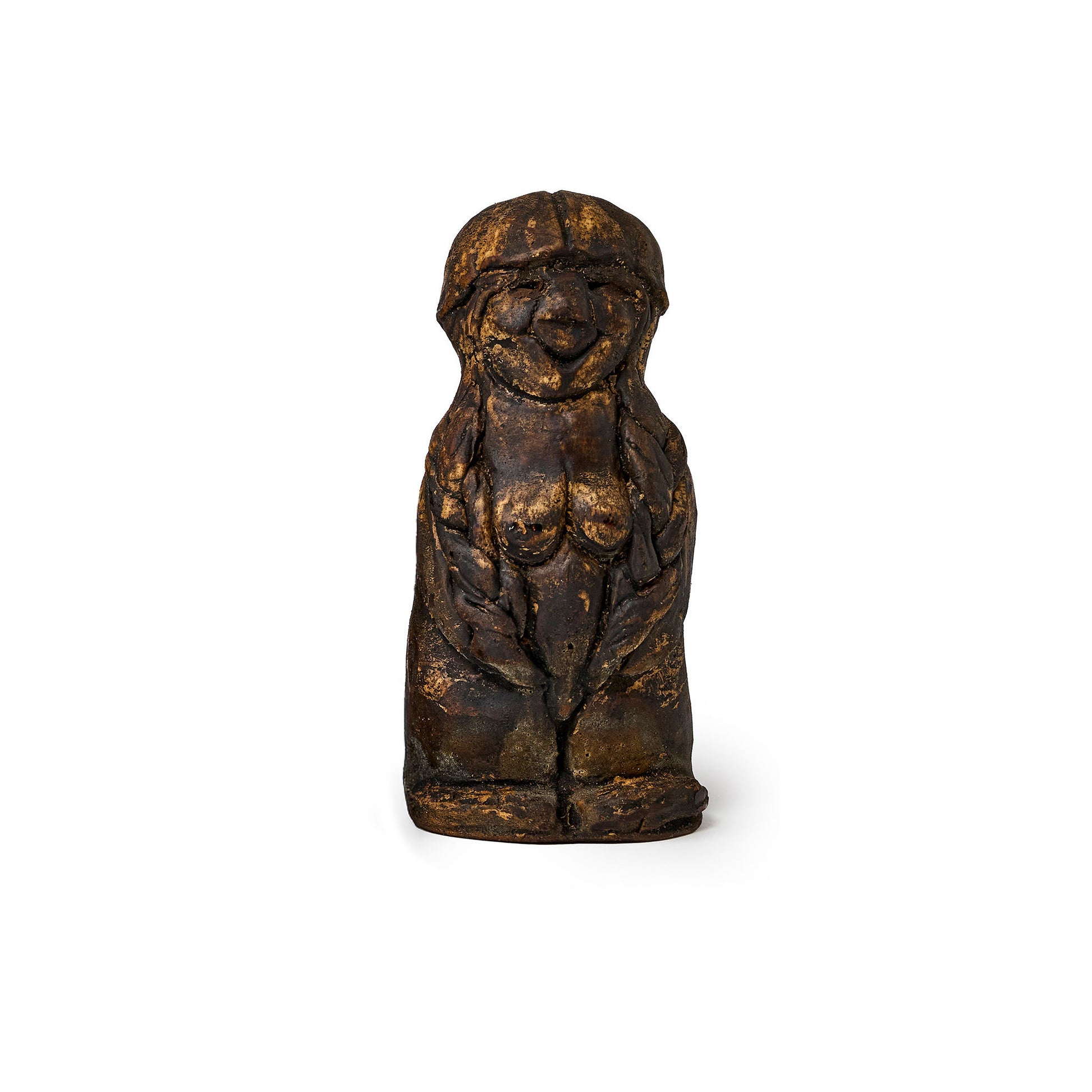 Small figure of an elf covered in pine tar front view