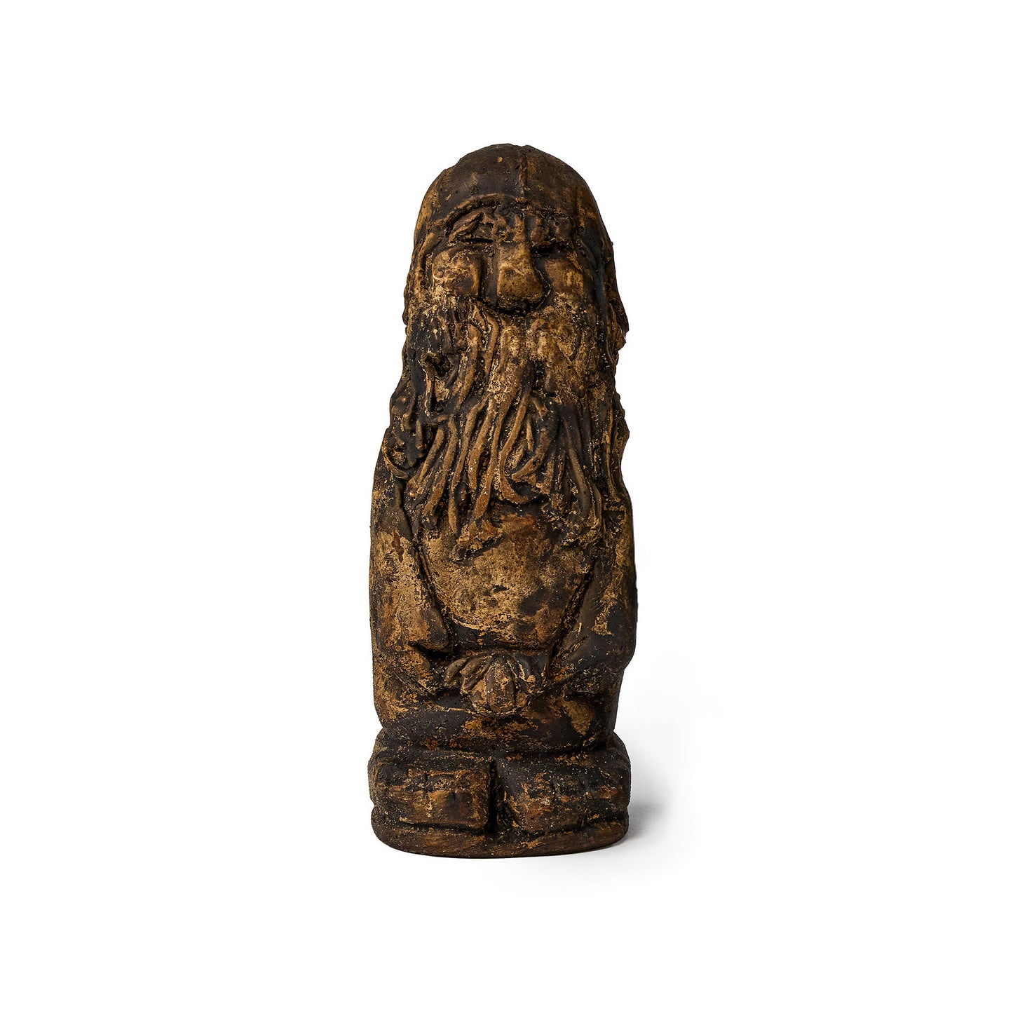 Small figure of an elf covered in pine tar front view