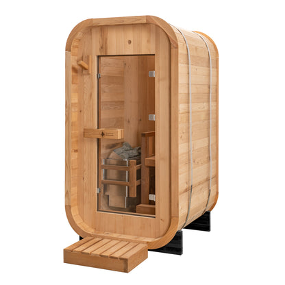 Redwood Outdoors Solo 1 person outdoor sauna, made of hemlock wood with a glass door view from a side angle.