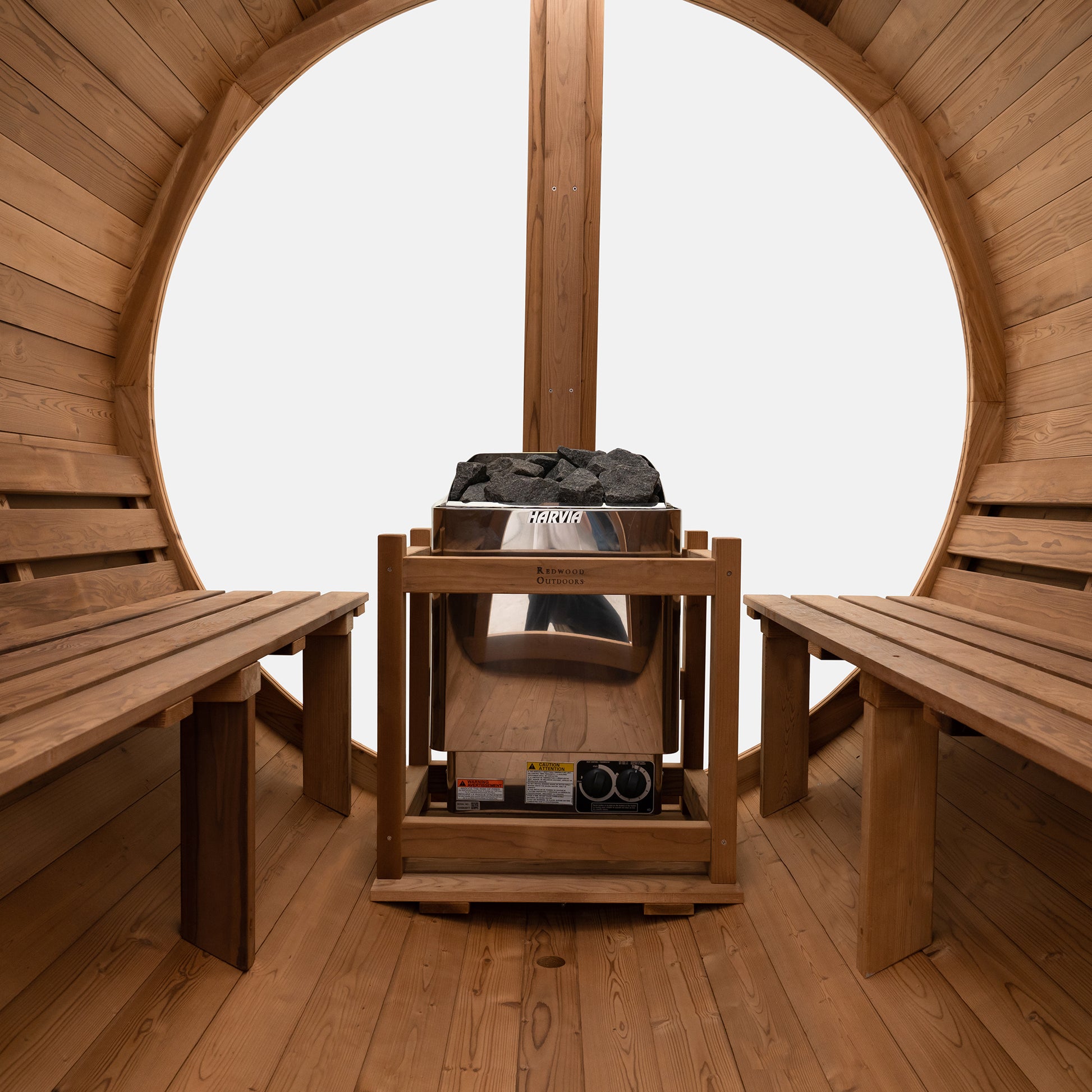 Redwood Outdoors Vista 6 person outdoor sauna, made of hemlock wood with large rear window, heater with guard and two benches on both sides.