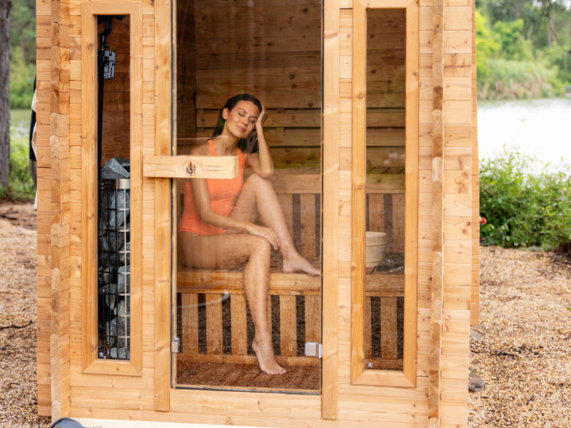 RedWood Outdoors Cabin 4 Person outdoor traditional sauna with glass door and large windows